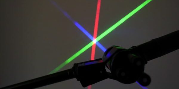 A close up of the light beams on a laser